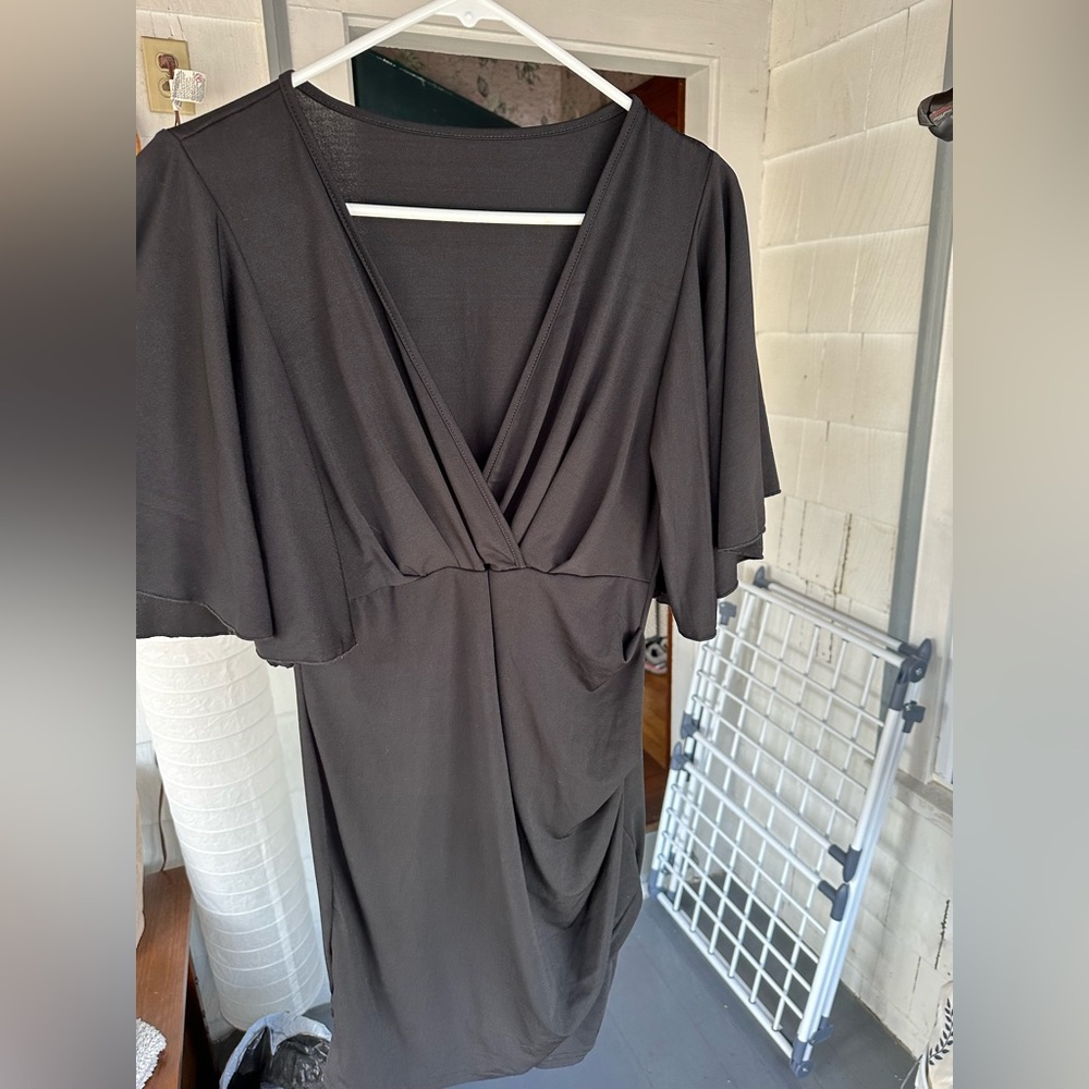 Black dress with side ruching detail. size M